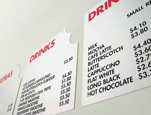 MUNCH wall-mounted drinks menu with a clean black typographic hierarchy